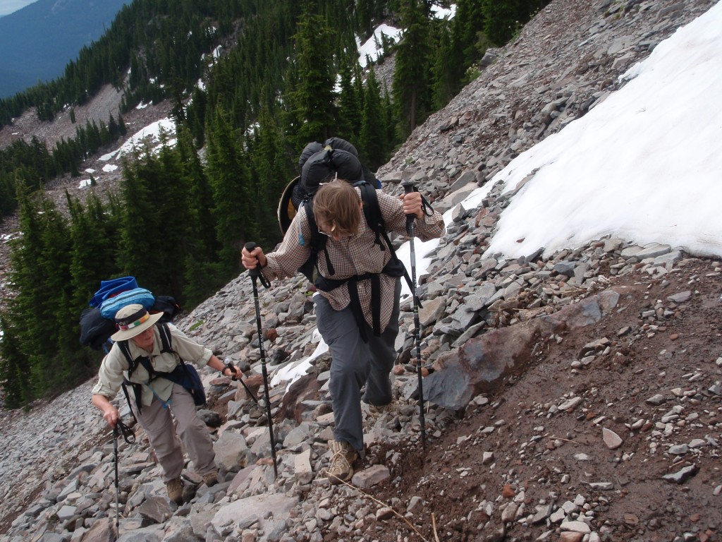 Alsie maneuvering along a mountain-side.